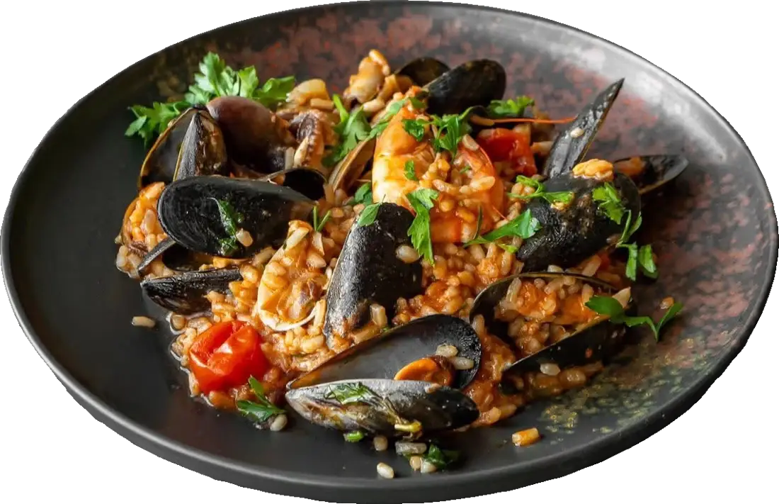 Arborio rice in a rich mixed seafood and tomato sauce.